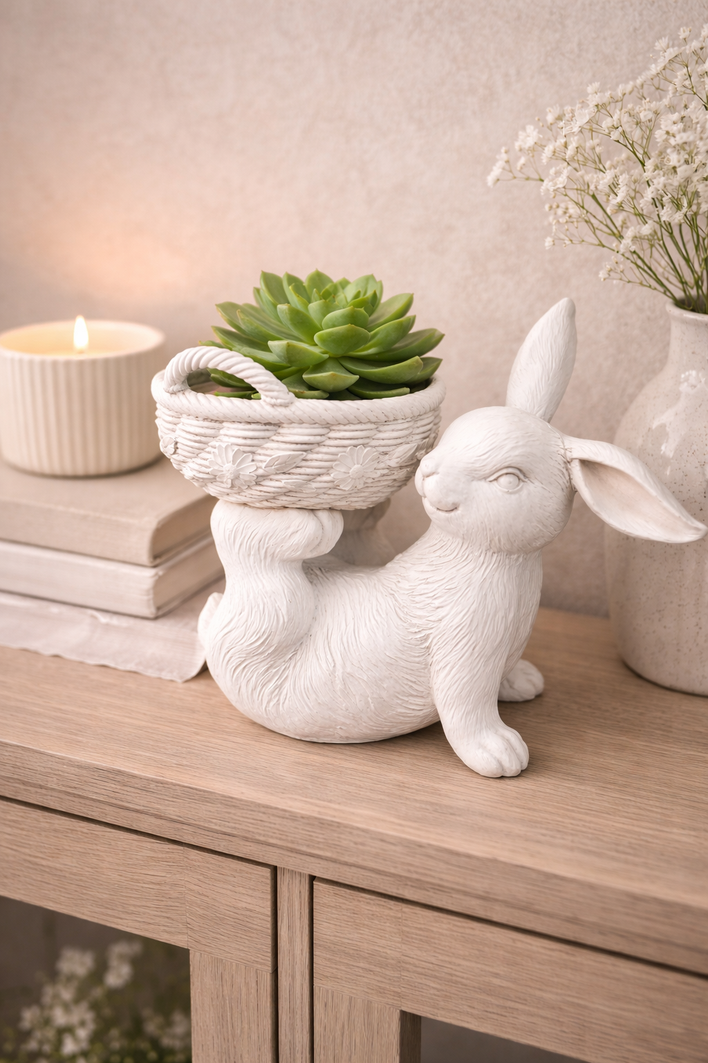 White rabbit basket planter 31cm filled with green succulent styled on a timber console with candle and books — home décor Australia Mistletoe Home