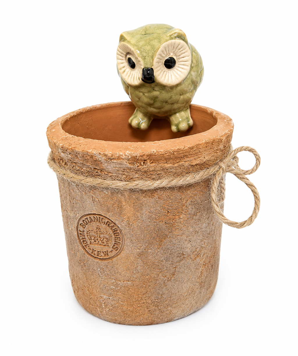 Green ceramic owl pot hanger perched inside the rim of a terracotta pot, shown on a plain white background
