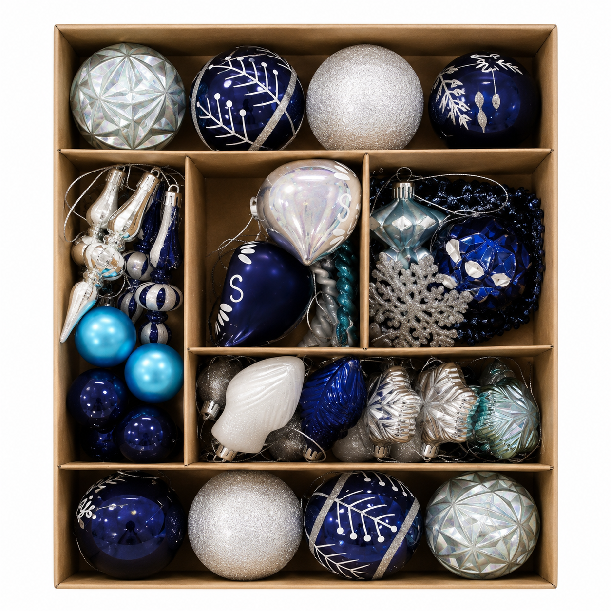70 piece navy and silver Christmas ornament set arranged in a compartmentalised gift box showing baubles, finials, beaded garland and snowflake pick