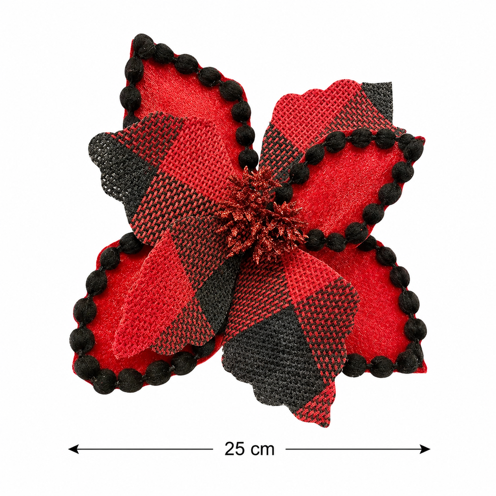 Buffalo plaid poinsettia Christmas tree picks clipped onto a lit Christmas tree with pinecones and ribbon