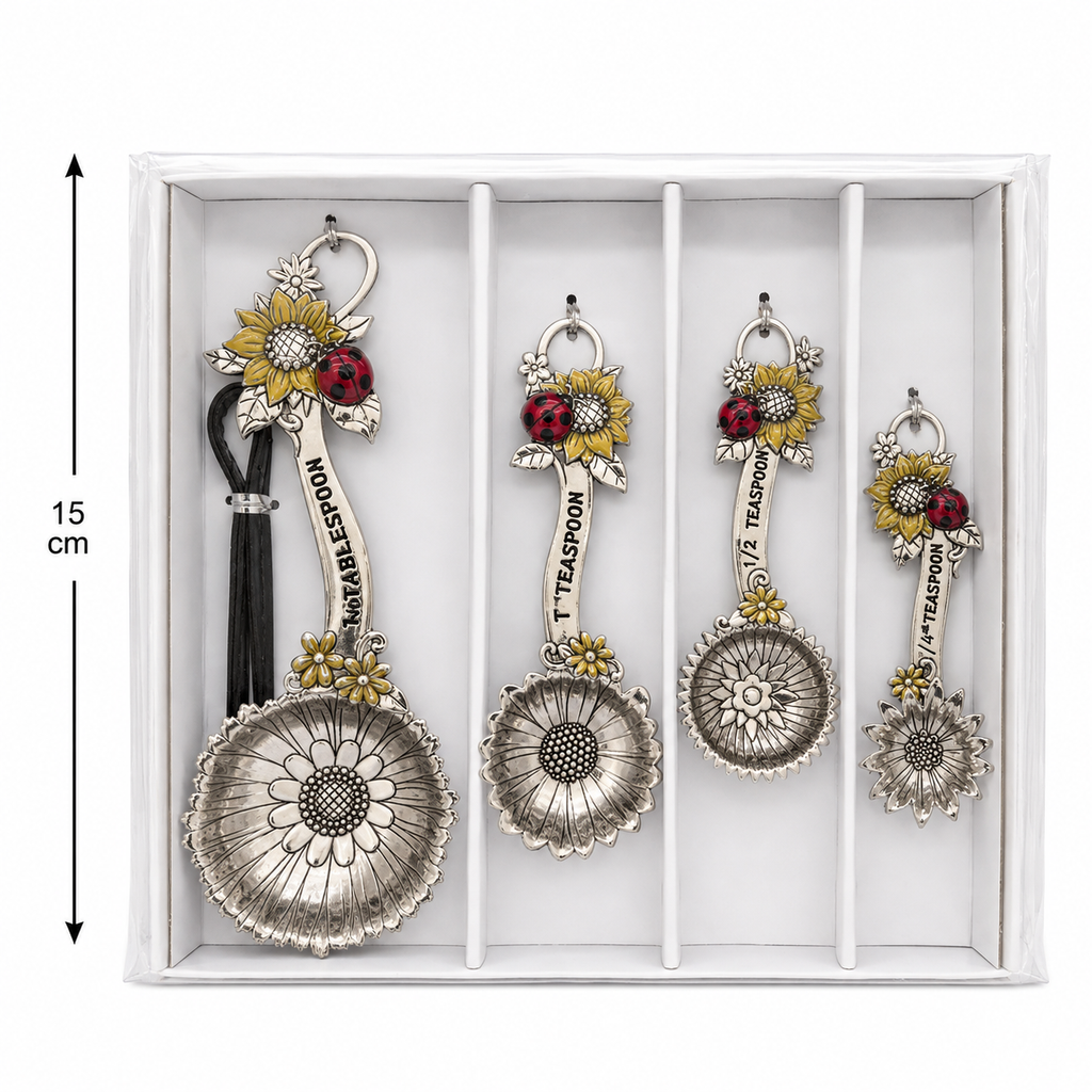 Sunflower and ladybird charm measuring spoon set in its gift box showing all four daisy-shaped spoons and 15cm height