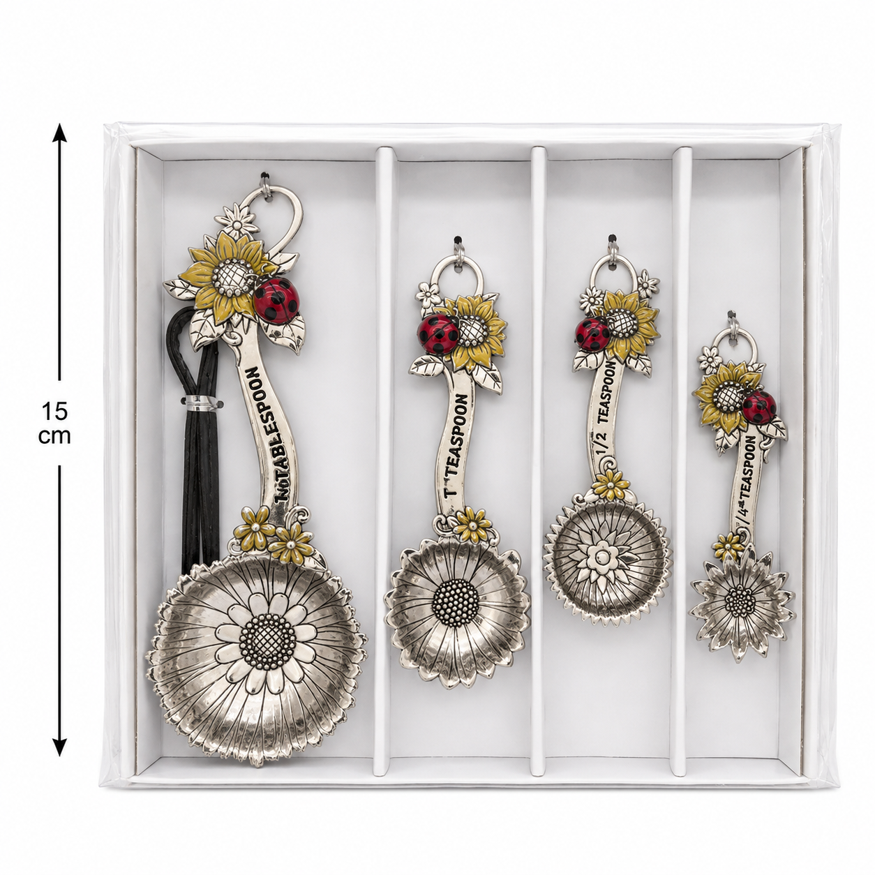 Sunflower and ladybird charm measuring spoon set in its gift box showing all four daisy-shaped spoons and 15cm height