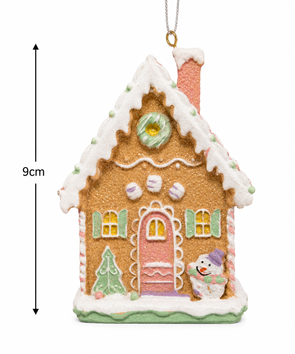 Pastel gingerbread house hanging ornament on white background showing 9cm height measurement