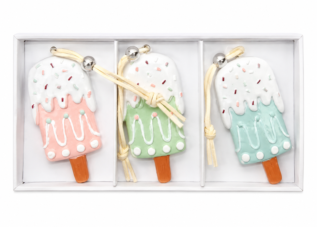 Set of 3 pastel popsicle Christmas ornaments in a white gift box showing pink, green and blue designs