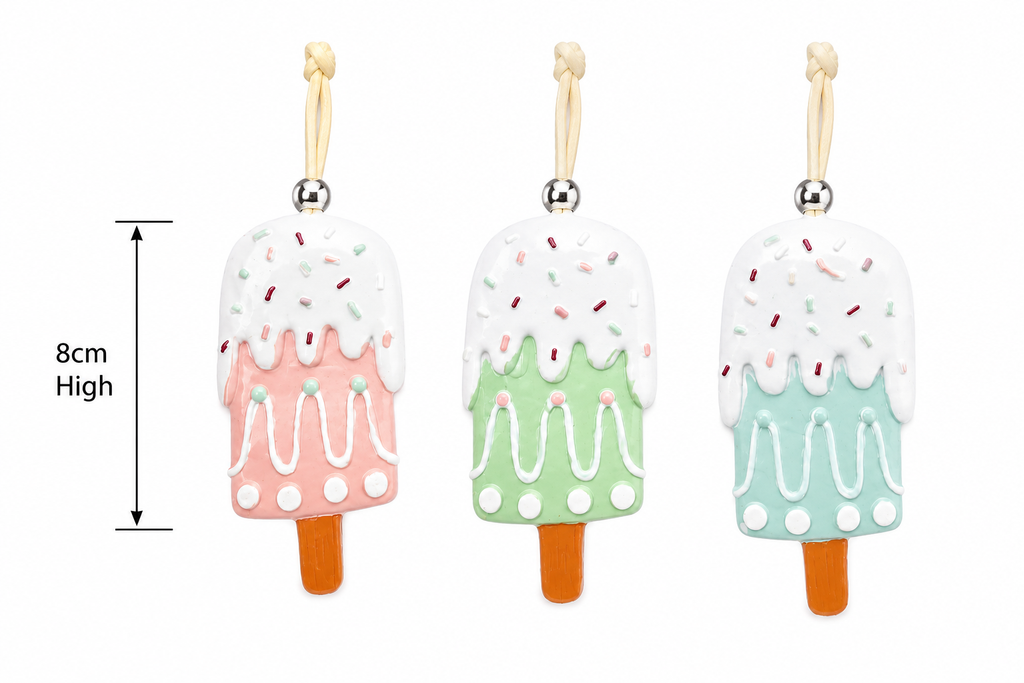 Pink, green and blue popsicle Christmas ornaments side by side on a plain background showing 8cm height measurement