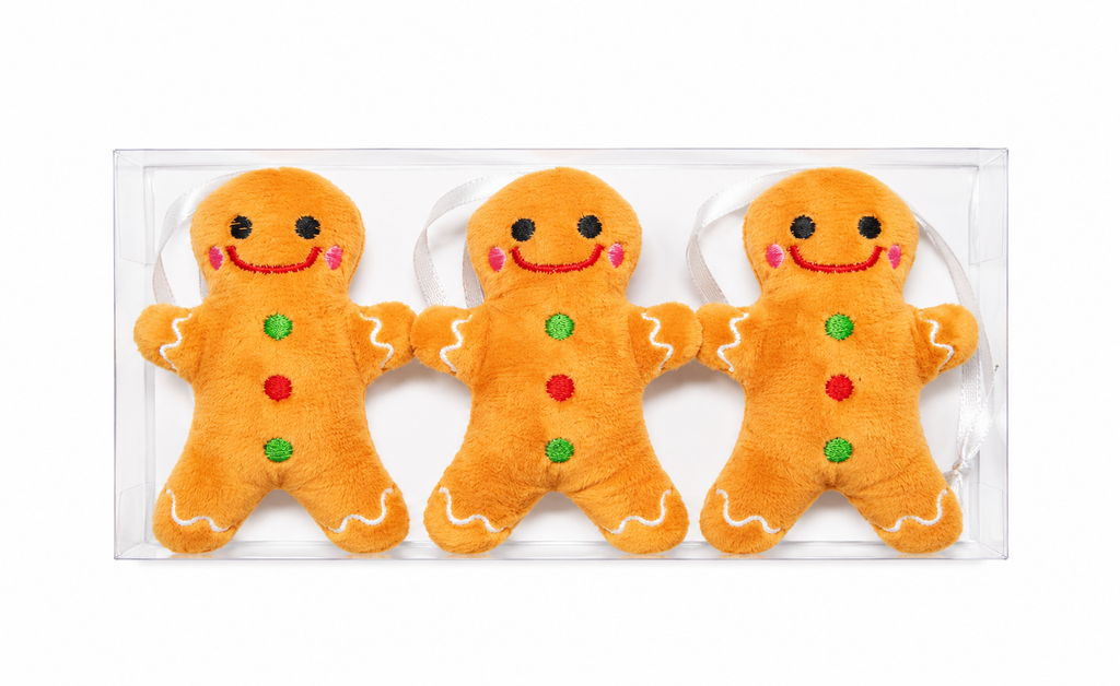 Set of 3 plush gingerbread man Christmas ornaments in a clear gift box showing matching embroidered designs