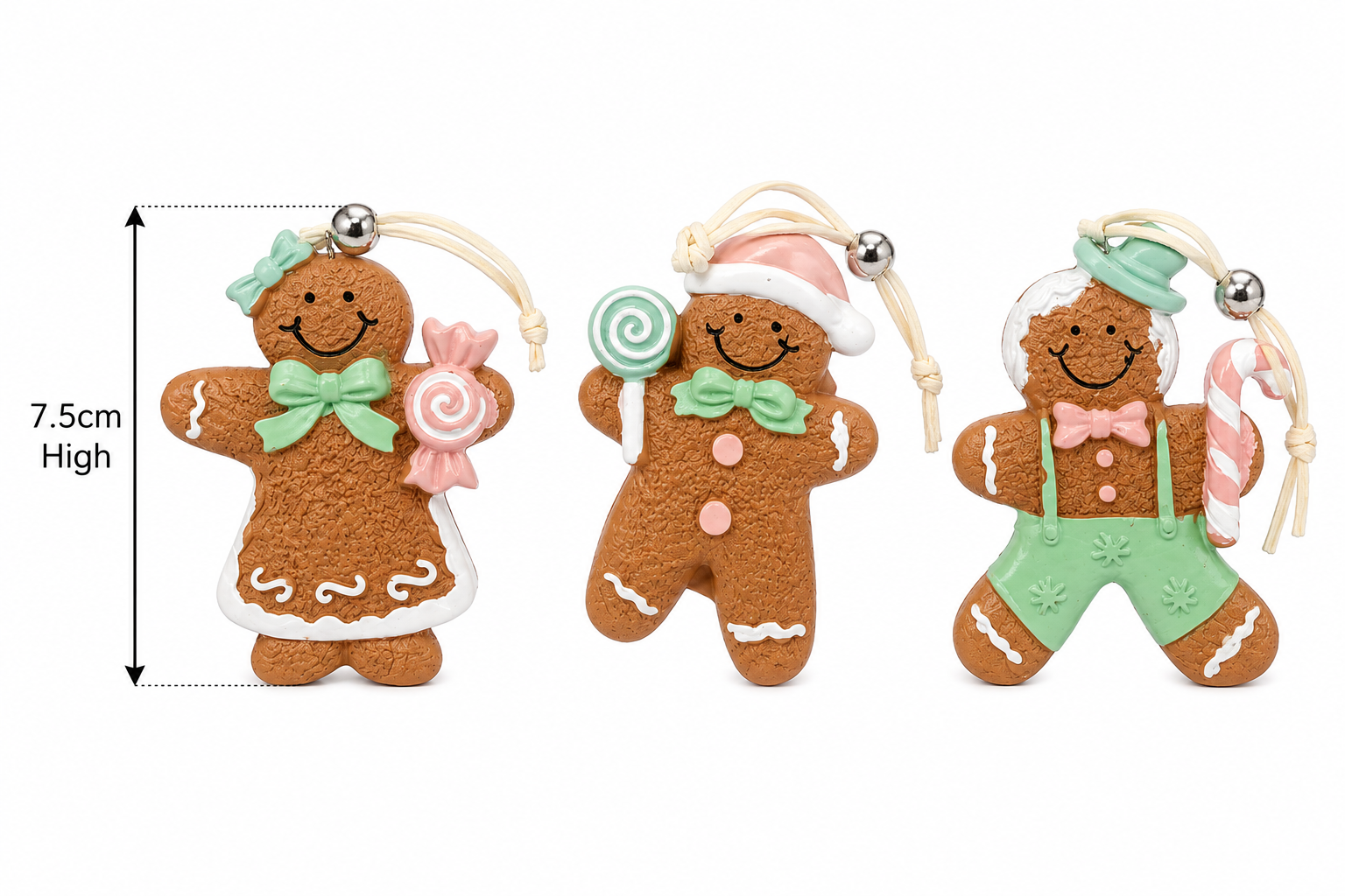 Set of 3 pastel gingerbread family Christmas ornaments on a plain background showing 7.5cm height measurement and full costume detail