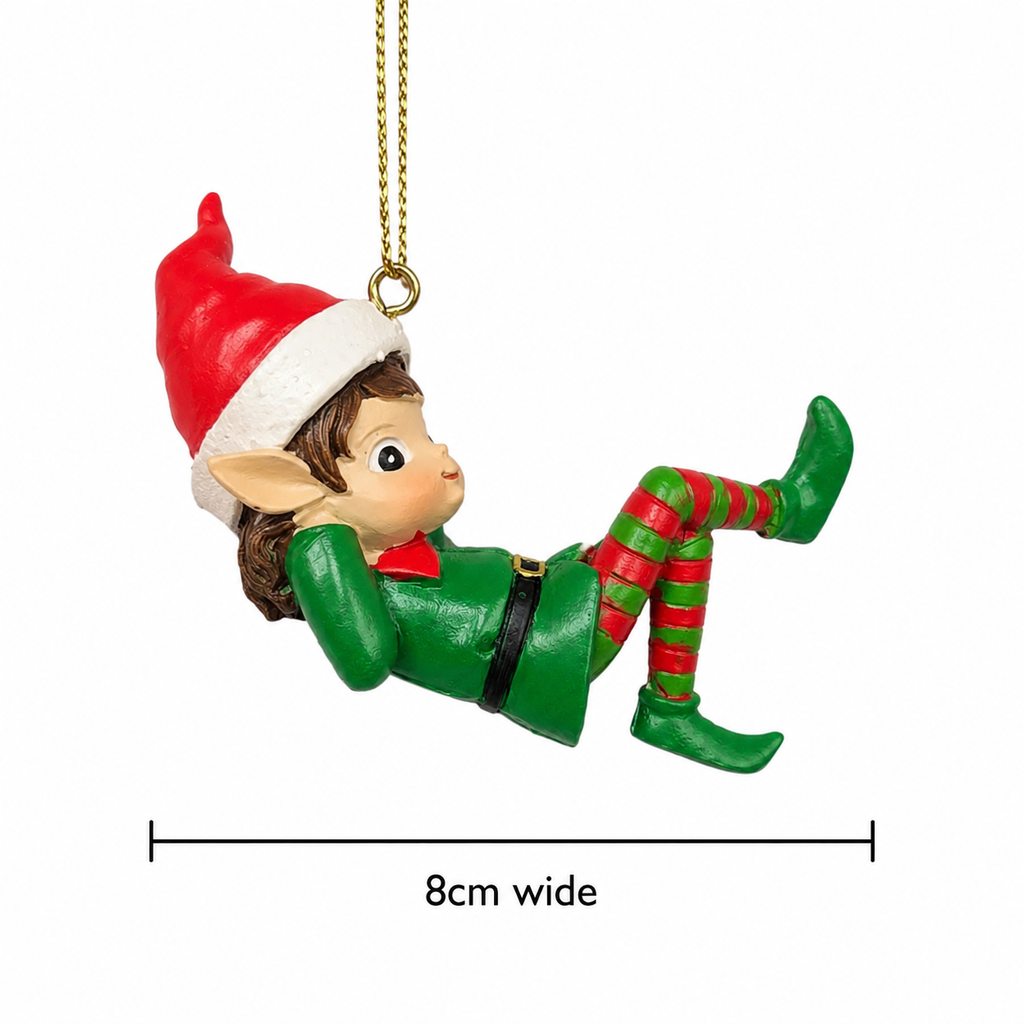 Swinging elf Christmas ornament on white background showing full reclined pose, red Santa hat, green outfit and striped stockings, 8cm wide.
