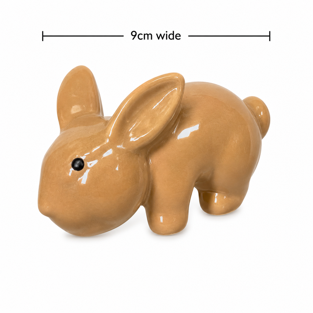 Ceramic bunny pot hanger on white background showing full side profile and glossy caramel glaze, 9cm wide.
