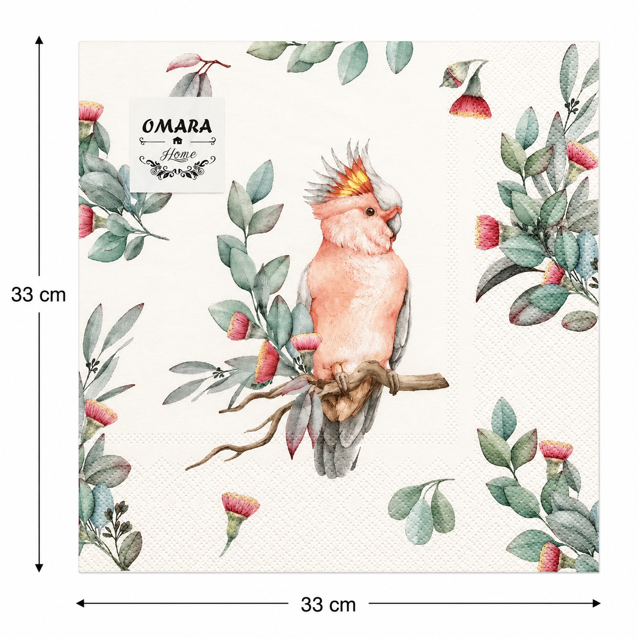 Pink cockatoo and gum blossom paper napkin folded on layered cream plates with a ceramic bird ornament, eucalyptus greenery and green glassware on a native-themed table setting