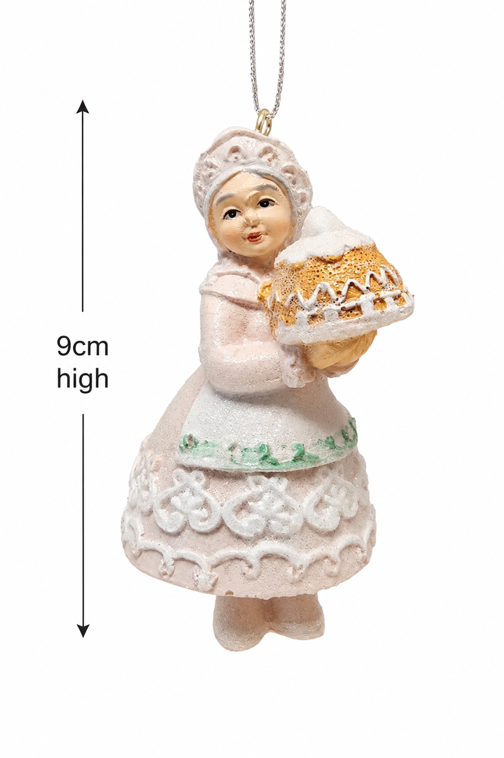 Pastel Mrs Claus pie ornament on a white background with a measurement arrow showing 9cm high