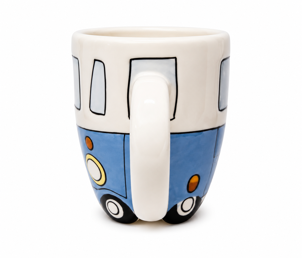  Side view of blue and white Kombi van ceramic mug showing side windows and handle detail on white background