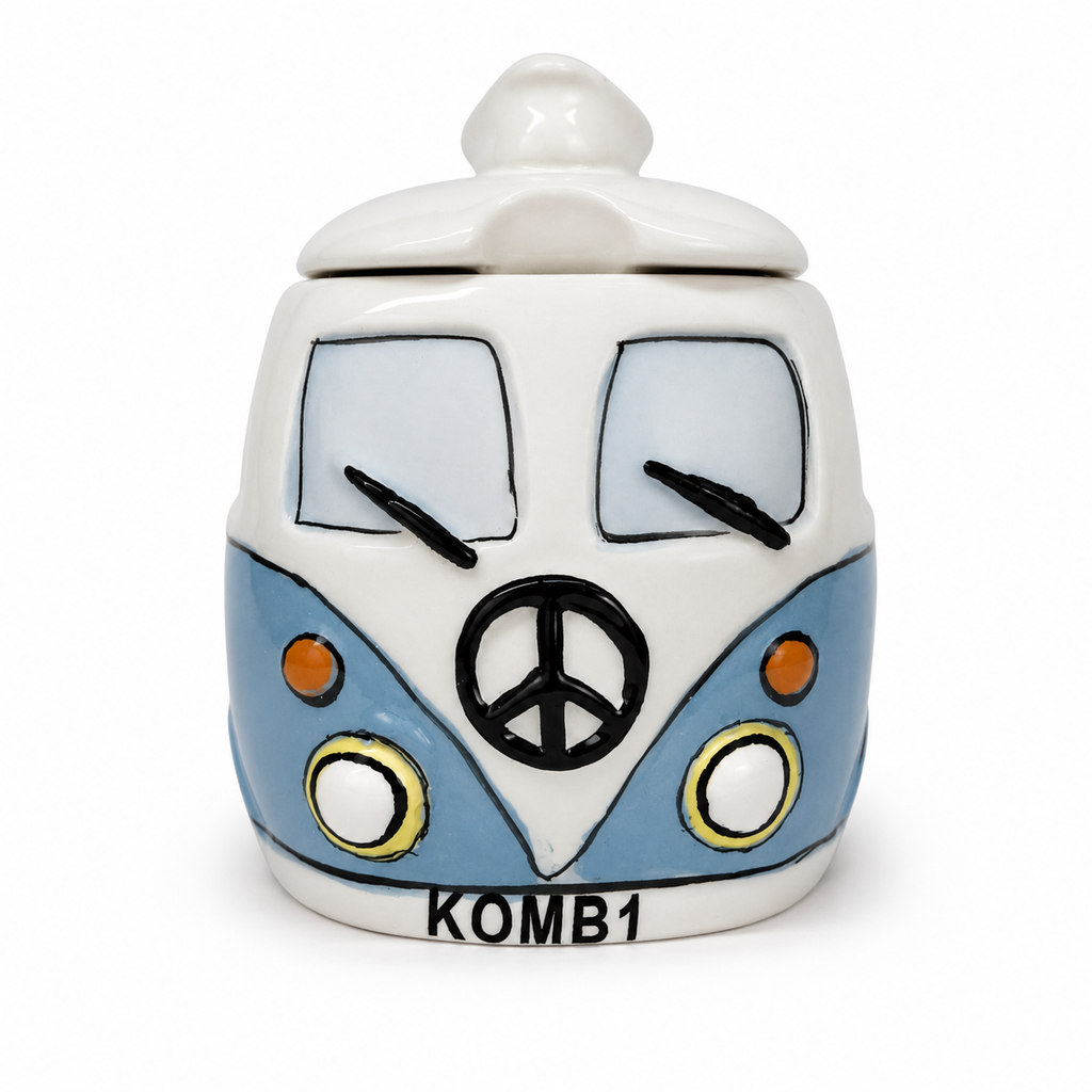 Blue Kombi sugar bowl front view on white background, showing peace sign, orange indicators, yellow headlight rings and KOMB1 plate detail