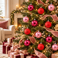 Hot pink, light pink and glitter pink baubles hanging on a decorated Christmas tree with blush velvet ribbon, fairy lights and wrapped gifts