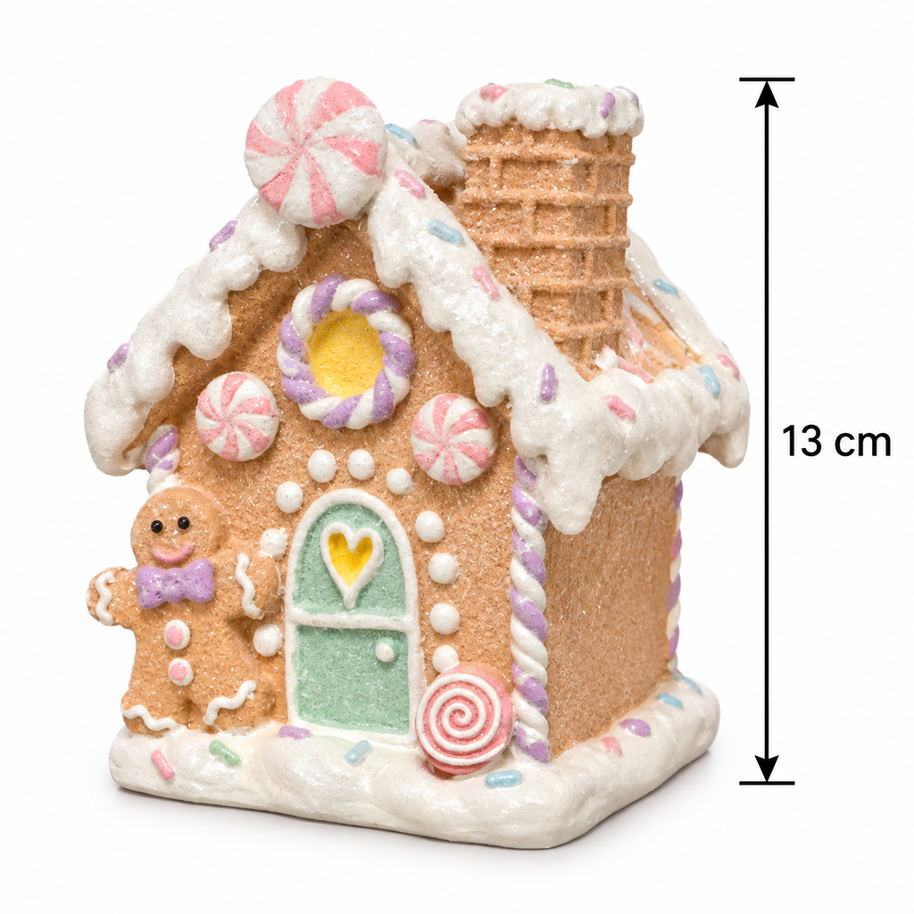 Pastel gingerbread house figurine on a white background with a measurement arrow showing 13cm height