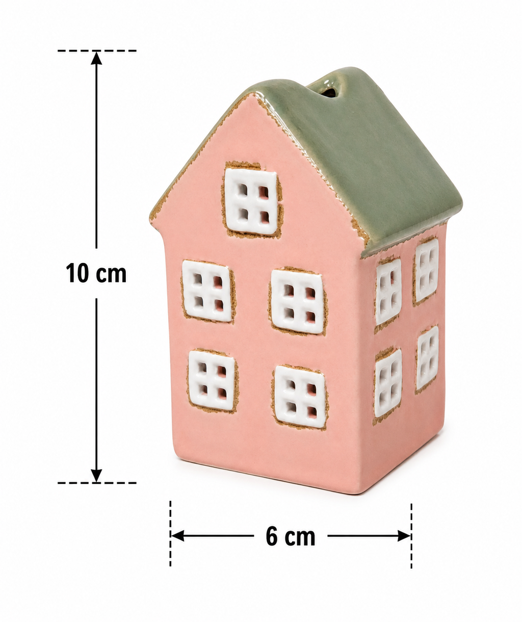 Pink and sage green ceramic house Christmas ornament on a white background with measurement arrows showing 10cm height and 6cm width.