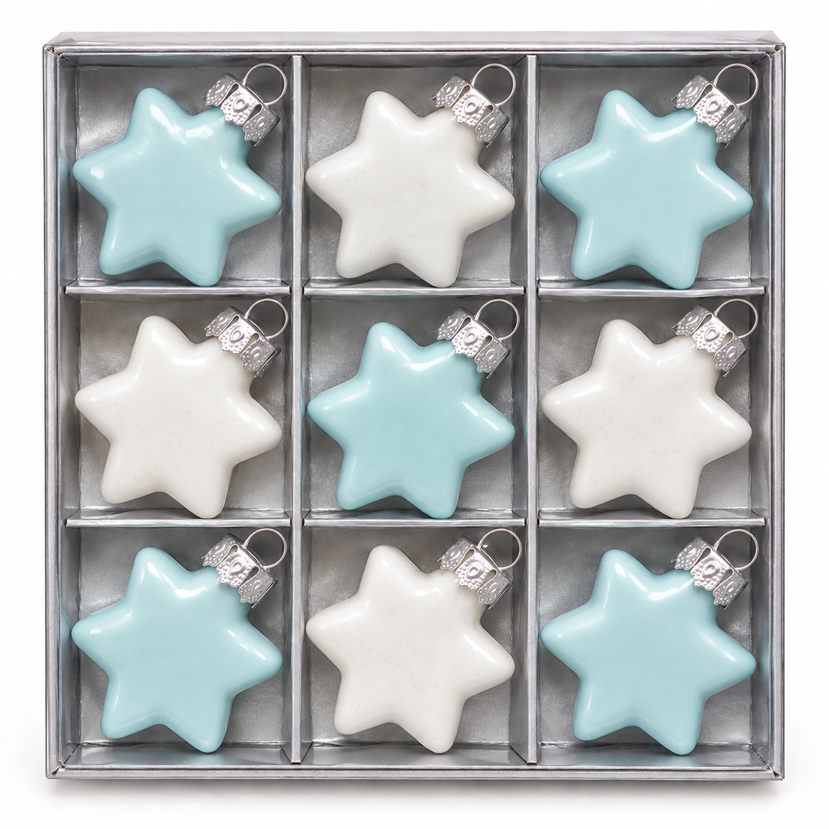 Set of 9 duck egg blue and white glass star ornaments arranged in a silver-tone gift box, three rows of three