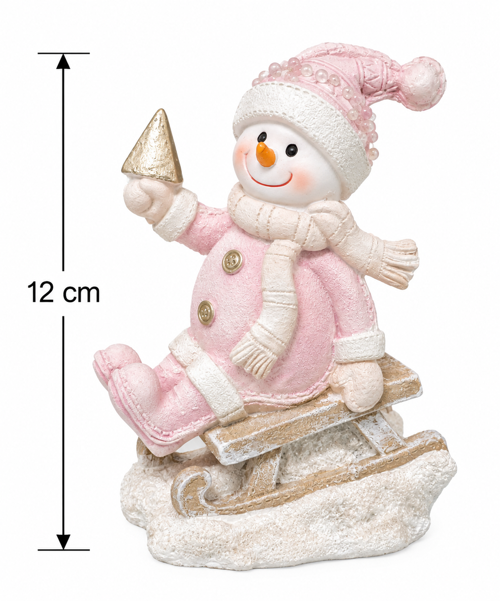 Pink snowman on sledge figurine on a white background showing 12cm height, holding a gold glitter tree while seated on a wooden-style sledge