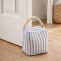 Blue and white stripe decorative doorstop with rope handle styled in coastal home — Mistletoe Home Australia