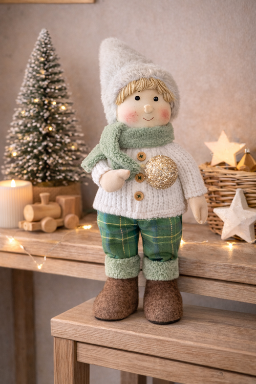 45cm standing Winter Boy Christmas decoration in knit sweater green tartan pants and grey hat styled on timber console with frosted Christmas tree and fairy lights — Mistletoe Home Australia