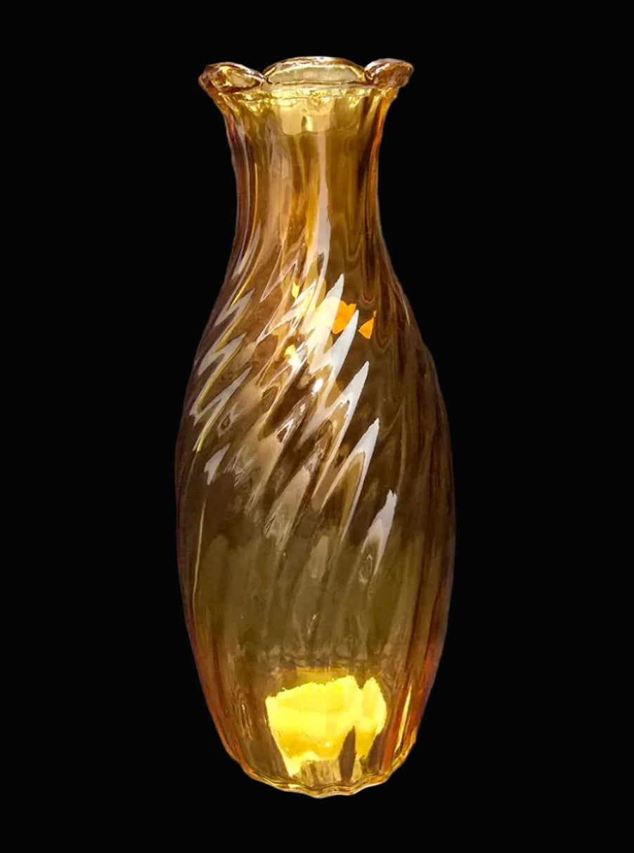 Amber twisted swirl glass vase with scalloped rim on black background — Mistletoe Home
