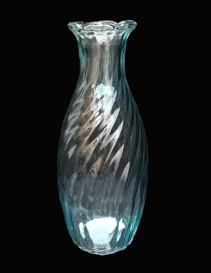 Clear blue twisted swirl glass vase with scalloped rim on black background — Mistletoe Home