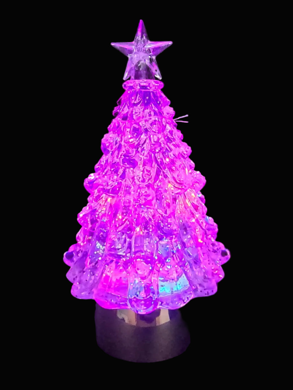 Clear acrylic LED Christmas tree with star topper glowing in pink and purple colour-changing light on black background — Mistletoe Home