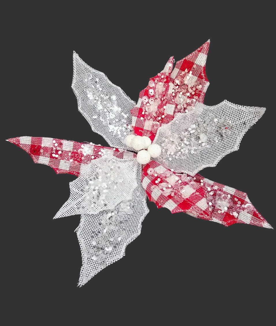 Red and white checkered poinsettia clip on Christmas decoration on black background — Mistletoe Home