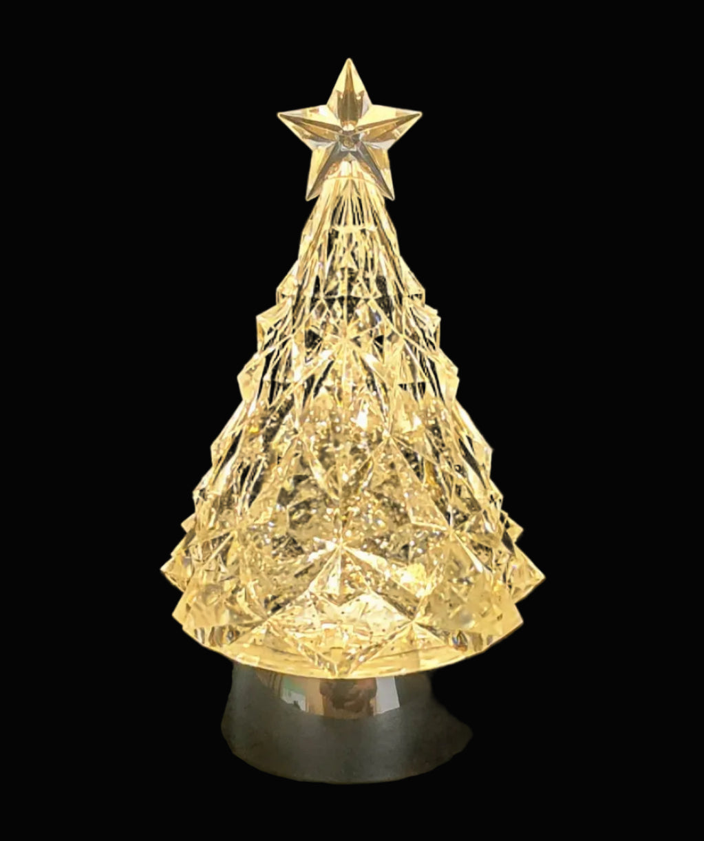 Gold crystal-cut acrylic LED Christmas tree with star topper glowing warm yellow light on black background — Mistletoe Home