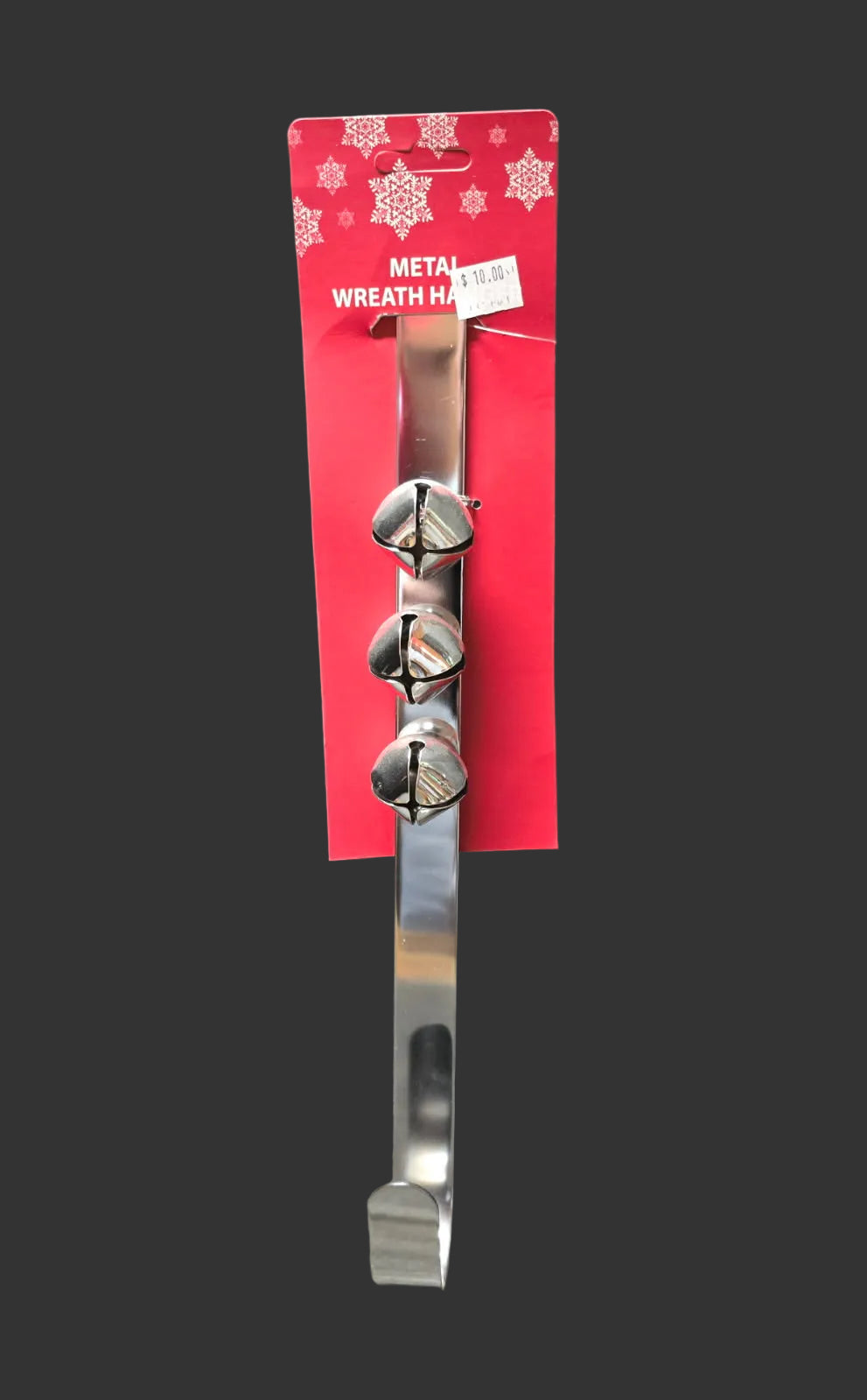 Silver metal over-the-door Christmas wreath hanger with three jingle bells on red packaging — Mistletoe Home Australia