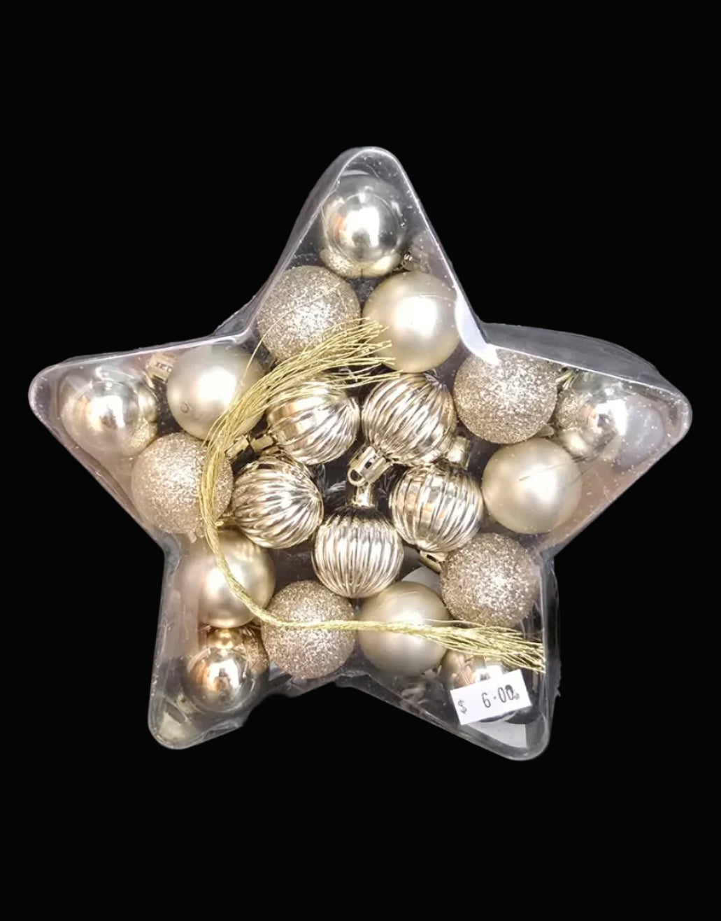 Pack of 20 mixed champagne Christmas baubles in matte, gloss, glitter and ribbed finishes displayed in a clear star-shaped gift box on black background — Mistletoe Home