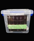Lexi 325 multicolour micro LED star curtain light in clear storage container with product label showing star curtain display on black background — Mistletoe Home
