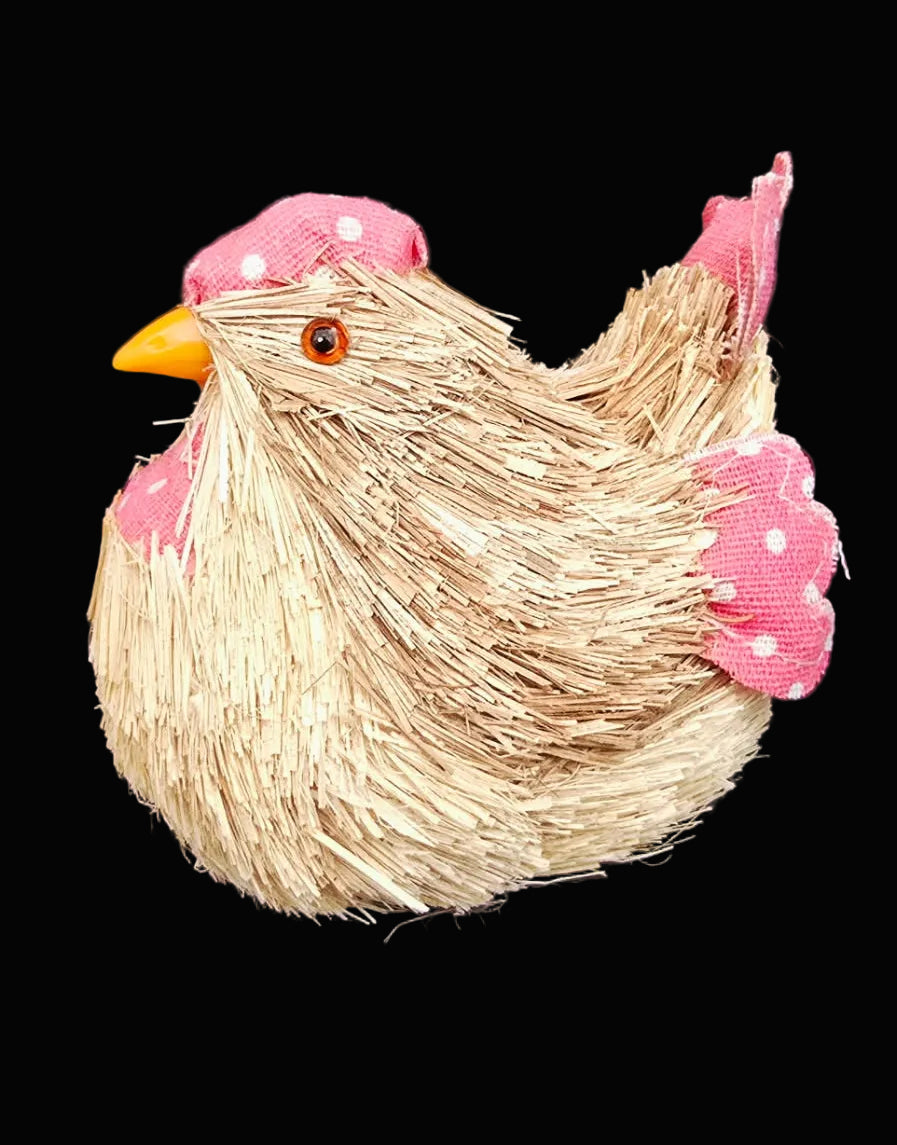 Pink polka dot straw chicken decoration with fabric cap, wings and yellow beak on black background — Mistletoe Home