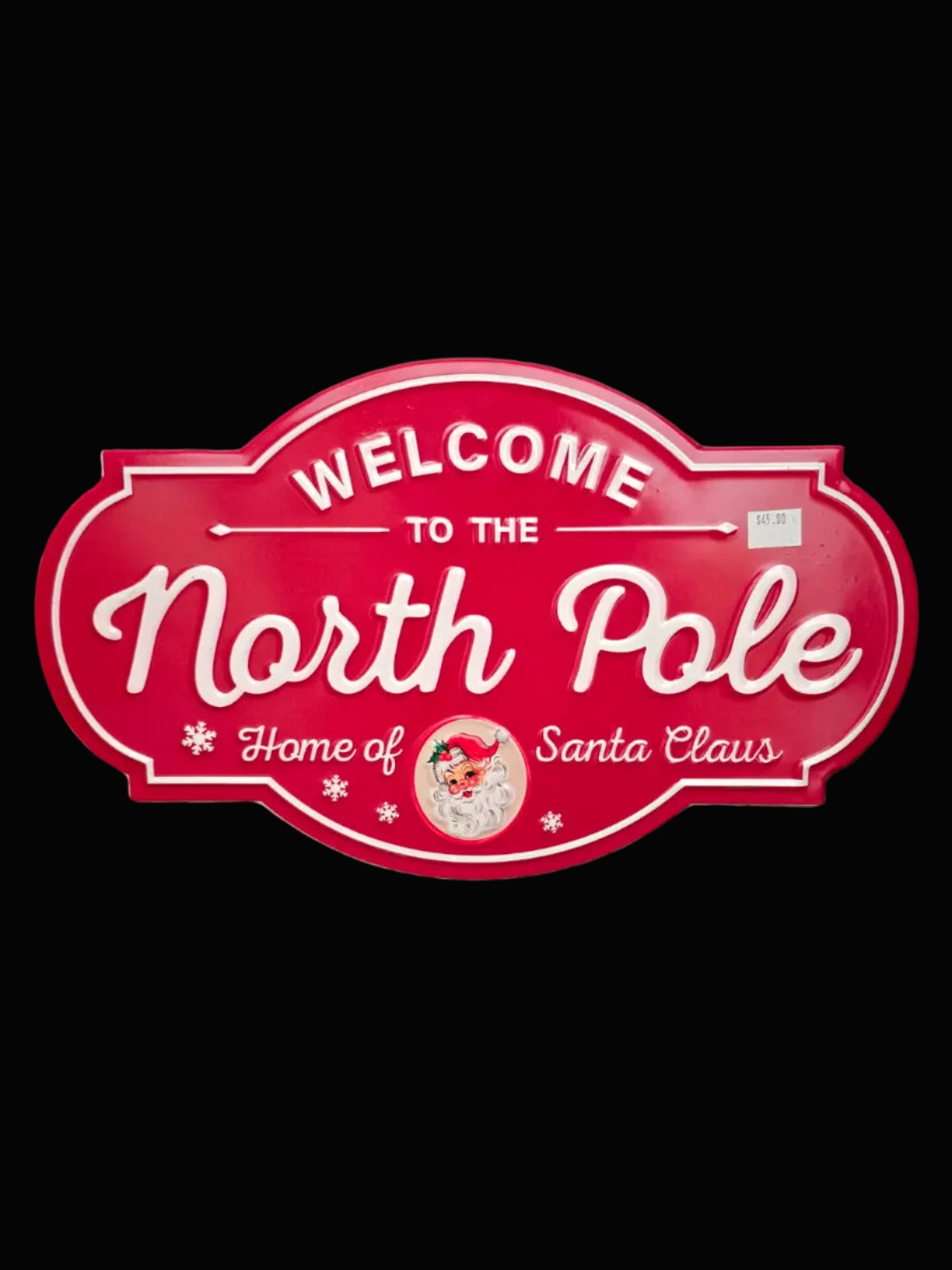 Welcome to the North Pole embossed red metal Christmas sign showing Santa Claus portrait and classic script lettering on dark background — Mistletoe Home Australia