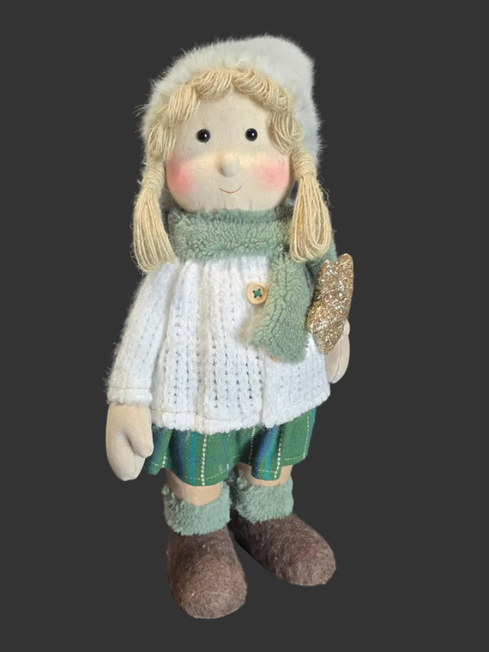 45cm standing Winter Girl Christmas decoration in detailed knit sweater tartan skirt and woolly boots holding gold glitter star on dark background — Mistletoe Home Australia
