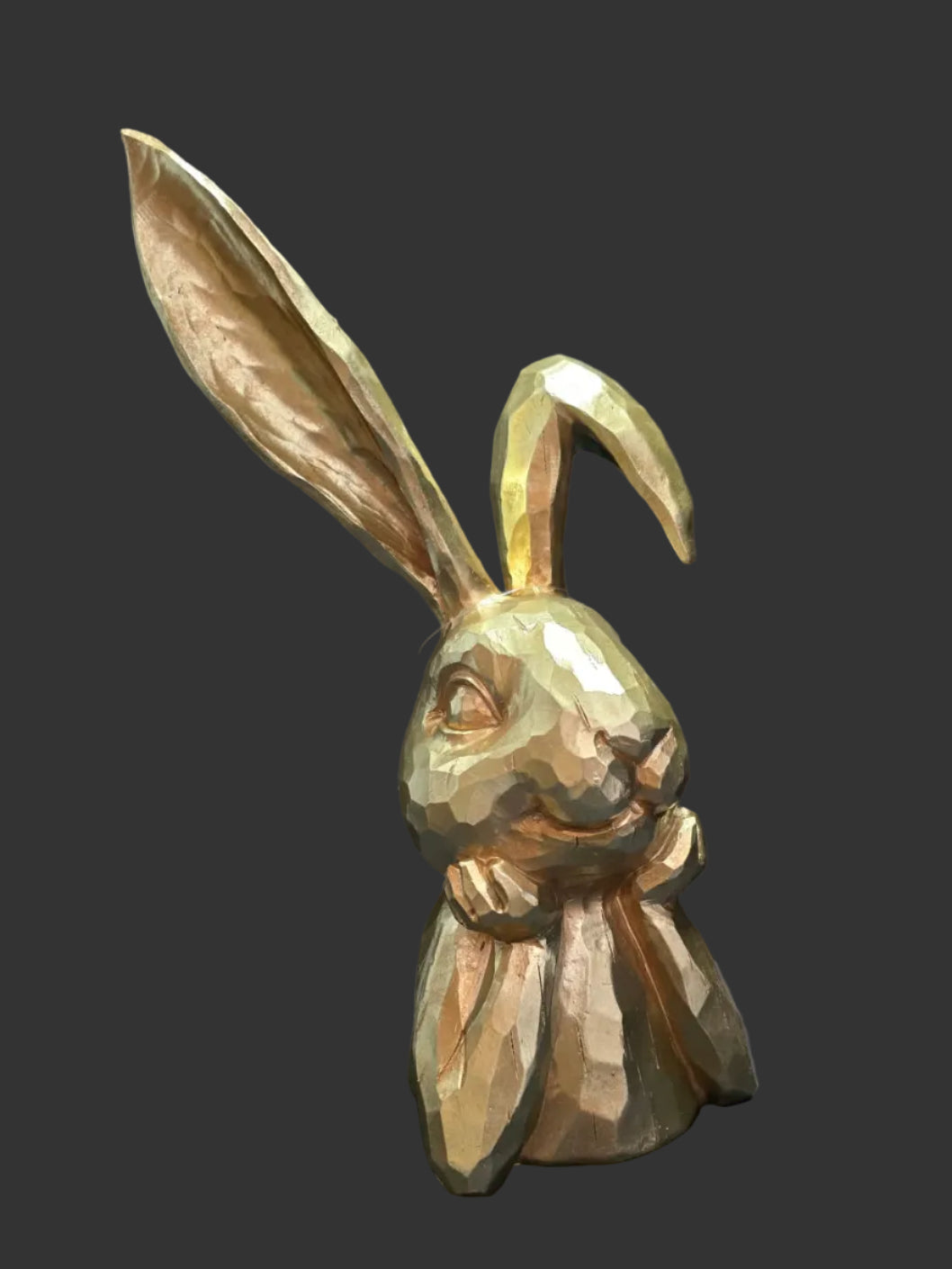 Close up of wishful gold rabbit resin figurine with antique gold faceted geometric detail on dark background — Mistletoe Home Australia
