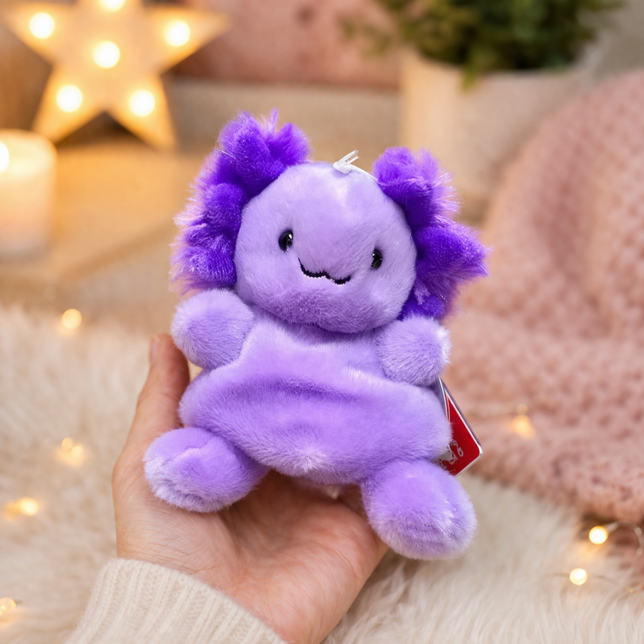 Palm Pals Xavier purple axolotl 13cm plush toy held in hand showing palm sized scale — cute gift for kids and teens Australia Mistletoe Home